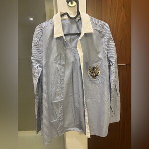 Elegant Blue and White Striped Women's Shirt with Tiger Detail